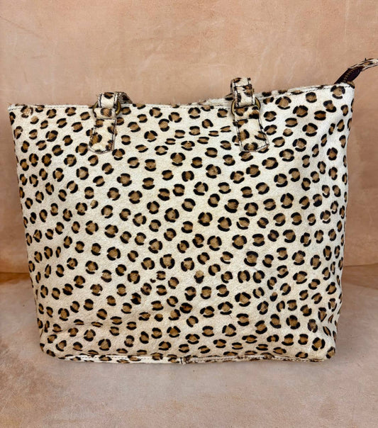 Savara leopard leather bag side view