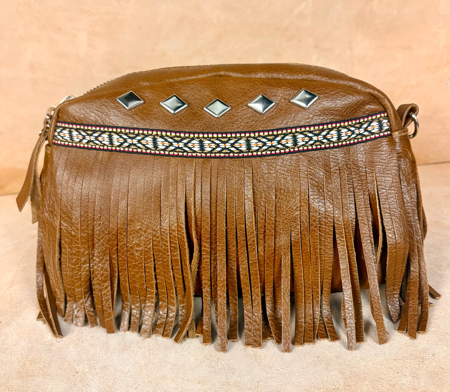 Masih Studio Arman Nomad fringe leather shoulder bag with boho design.
