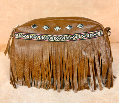 Masih Studio Arman Nomad fringe leather shoulder bag with boho design.