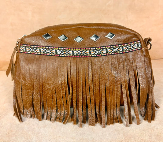 Masih Studio Arman Nomad fringe leather shoulder bag with boho design.