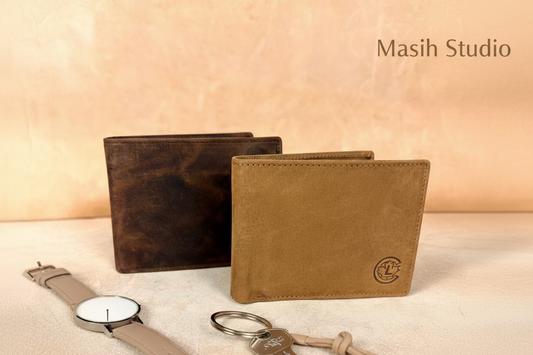 Brown leather bifold wallet with coin pocket and card slots