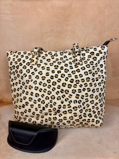 Savara leopard hair leather handbag detail texture