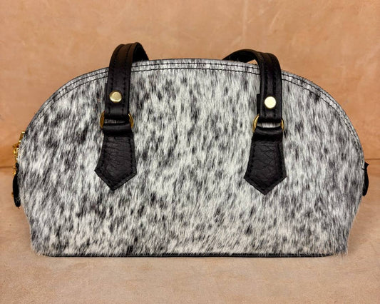 Nomad Arc spotted pony hair leather handbag front view